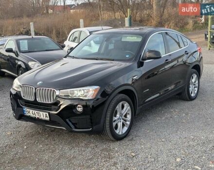 Черный БМВ Х4, объемом двигателя 2 л и пробегом 95 тыс. км за 20850 $, фото 4 на Automoto.ua