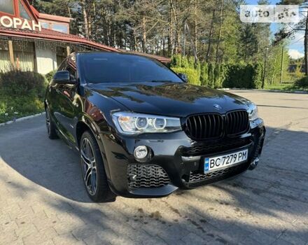 Чорний БМВ Х4, об'ємом двигуна 2 л та пробігом 180 тис. км за 25500 $, фото 2 на Automoto.ua