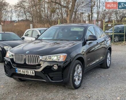 Черный БМВ Х4, объемом двигателя 2 л и пробегом 95 тыс. км за 20850 $, фото 1 на Automoto.ua