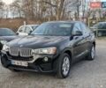 Черный БМВ Х4, объемом двигателя 2 л и пробегом 95 тыс. км за 20850 $, фото 1 на Automoto.ua
