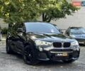Черный БМВ Х4, объемом двигателя 2 л и пробегом 106 тыс. км за 26500 $, фото 1 на Automoto.ua