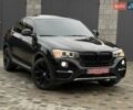 Черный БМВ Х4, объемом двигателя 3 л и пробегом 220 тыс. км за 17700 $, фото 1 на Automoto.ua