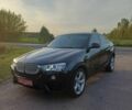 Черный БМВ Х4, объемом двигателя 2 л и пробегом 226 тыс. км за 17200 $, фото 1 на Automoto.ua