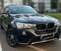 Черный БМВ Х4, объемом двигателя 2 л и пробегом 172 тыс. км за 24800 $, фото 1 на Automoto.ua
