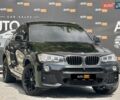Чорний БМВ Х4, об'ємом двигуна 2 л та пробігом 106 тис. км за 26500 $, фото 1 на Automoto.ua
