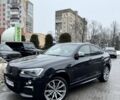 Черный БМВ Х4, объемом двигателя 3 л и пробегом 136 тыс. км за 26700 $, фото 1 на Automoto.ua