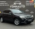 Черный БМВ Х4, объемом двигателя 3 л и пробегом 203 тыс. км за 25500 $, фото 1 на Automoto.ua