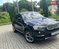 Чорний БМВ Х4, об'ємом двигуна 2 л та пробігом 121 тис. км за 22500 $, фото 1 на Automoto.ua