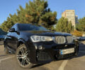 Чорний БМВ Х4, об'ємом двигуна 2 л та пробігом 97 тис. км за 25500 $, фото 1 на Automoto.ua