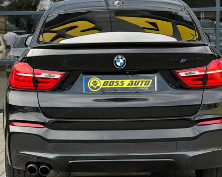 Черный БМВ Х4, объемом двигателя 3 л и пробегом 165 тыс. км за 26500 $, фото 4 на Automoto.ua