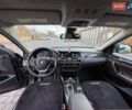 Чорний БМВ Х4, об'ємом двигуна 2 л та пробігом 98 тис. км за 27000 $, фото 2 на Automoto.ua