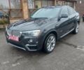 Черный БМВ Х4, объемом двигателя 2 л и пробегом 256 тыс. км за 14800 $, фото 1 на Automoto.ua