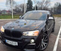 Черный БМВ Х4, объемом двигателя 2.98 л и пробегом 77 тыс. км за 33800 $, фото 1 на Automoto.ua
