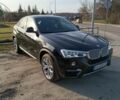 Чорний БМВ Х4, об'ємом двигуна 2 л та пробігом 130 тис. км за 23700 $, фото 1 на Automoto.ua