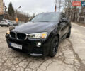 Черный БМВ Х4, объемом двигателя 2 л и пробегом 120 тыс. км за 24100 $, фото 1 на Automoto.ua