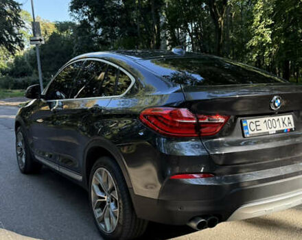 Черный БМВ Х4, объемом двигателя 2 л и пробегом 171 тыс. км за 27700 $, фото 23 на Automoto.ua
