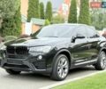 Черный БМВ Х4, объемом двигателя 2 л и пробегом 91 тыс. км за 25700 $, фото 1 на Automoto.ua