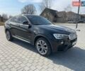 Черный БМВ Х4, объемом двигателя 2 л и пробегом 201 тыс. км за 17800 $, фото 1 на Automoto.ua