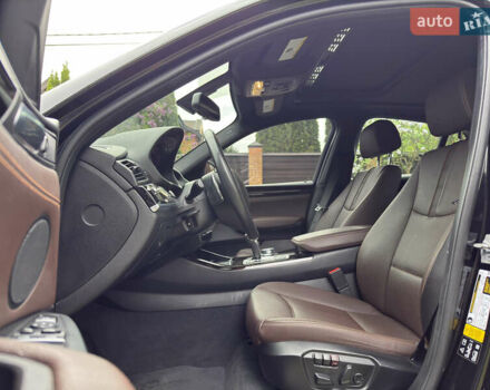 Черный БМВ Х4, объемом двигателя 2 л и пробегом 91 тыс. км за 25700 $, фото 23 на Automoto.ua