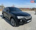 Черный БМВ Х4, объемом двигателя 2 л и пробегом 201 тыс. км за 17800 $, фото 2 на Automoto.ua