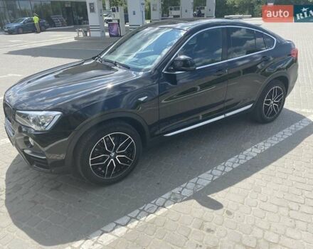 Черный БМВ Х4, объемом двигателя 2 л и пробегом 71 тыс. км за 29848 $, фото 2 на Automoto.ua