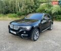 Черный БМВ Х4, объемом двигателя 2 л и пробегом 201 тыс. км за 17700 $, фото 1 на Automoto.ua