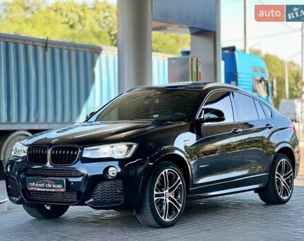 Черный БМВ Х4, объемом двигателя 2 л и пробегом 89 тыс. км за 30999 $, фото 1 на Automoto.ua