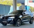 Черный БМВ Х4, объемом двигателя 2 л и пробегом 89 тыс. км за 30999 $, фото 1 на Automoto.ua