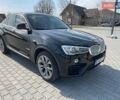 Черный БМВ Х4, объемом двигателя 2 л и пробегом 201 тыс. км за 17800 $, фото 1 на Automoto.ua