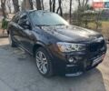 Черный БМВ Х4, объемом двигателя 3 л и пробегом 125 тыс. км за 28290 $, фото 2 на Automoto.ua
