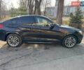 Черный БМВ Х4, объемом двигателя 3 л и пробегом 125 тыс. км за 28290 $, фото 4 на Automoto.ua