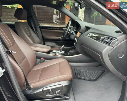 Черный БМВ Х4, объемом двигателя 2 л и пробегом 91 тыс. км за 25700 $, фото 6 на Automoto.ua