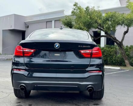 Чорний БМВ Х4, об'ємом двигуна 3 л та пробігом 37 тис. км за 19900 $, фото 5 на Automoto.ua