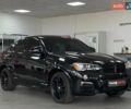 Чорний БМВ Х4, об'ємом двигуна 3 л та пробігом 210 тис. км за 23490 $, фото 1 на Automoto.ua
