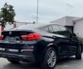 Черный БМВ Х4, объемом двигателя 3 л и пробегом 48 тыс. км за 16700 $, фото 3 на Automoto.ua