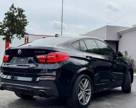 Чорний БМВ Х4, об'ємом двигуна 3 л та пробігом 37 тис. км за 19900 $, фото 4 на Automoto.ua