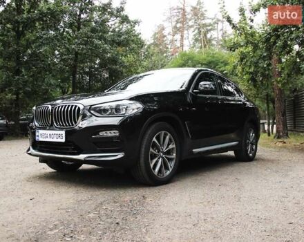 Черный БМВ Х4, объемом двигателя 2 л и пробегом 65 тыс. км за 39990 $, фото 1 на Automoto.ua