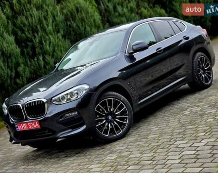 Черный БМВ Х4, объемом двигателя 2 л и пробегом 89 тыс. км за 42900 $, фото 1 на Automoto.ua