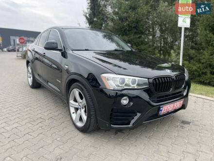 Черный БМВ Х4, объемом двигателя 2 л и пробегом 258 тыс. км за 15999 $, фото 1 на Automoto.ua