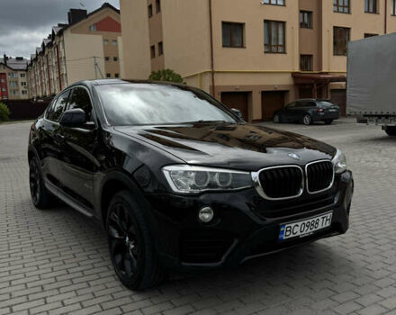 Черный БМВ Х4, объемом двигателя 2 л и пробегом 150 тыс. км за 21000 $, фото 1 на Automoto.ua