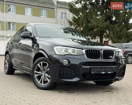 Черный БМВ Х4, объемом двигателя 2 л и пробегом 217 тыс. км за 26350 $, фото 1 на Automoto.ua
