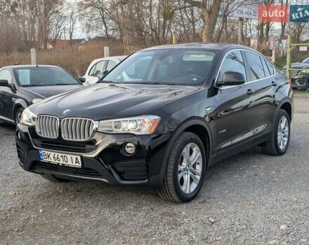 Черный БМВ Х4, объемом двигателя 2 л и пробегом 95 тыс. км за 20850 $, фото 1 на Automoto.ua