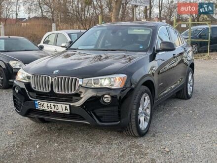 Черный БМВ Х4, объемом двигателя 2 л и пробегом 95 тыс. км за 20850 $, фото 1 на Automoto.ua