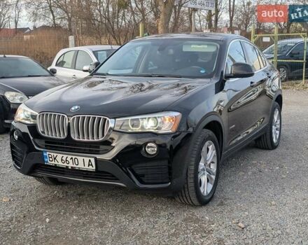 Черный БМВ Х4, объемом двигателя 2 л и пробегом 95 тыс. км за 20850 $, фото 1 на Automoto.ua
