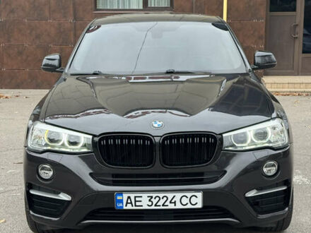 Черный БМВ Х4, объемом двигателя 2 л и пробегом 112 тыс. км за 22500 $, фото 1 на Automoto.ua