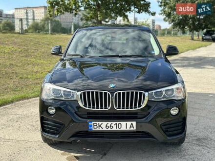 Черный БМВ Х4, объемом двигателя 2 л и пробегом 94 тыс. км за 26400 $, фото 1 на Automoto.ua