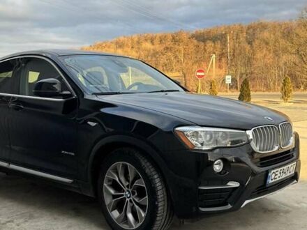 Черный БМВ Х4, объемом двигателя 2 л и пробегом 98 тыс. км за 27000 $, фото 1 на Automoto.ua