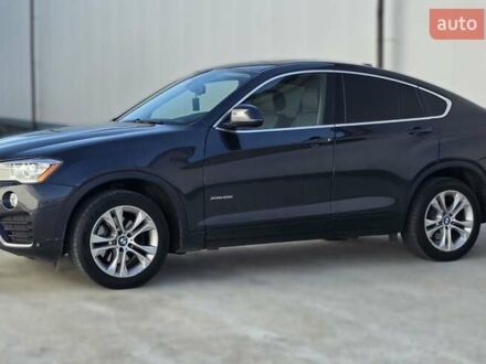 Чорний БМВ Х4, об'ємом двигуна 2 л та пробігом 145 тис. км за 22999 $, фото 1 на Automoto.ua