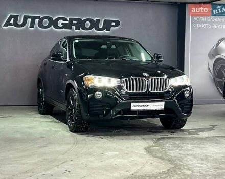 Черный БМВ Х4, объемом двигателя 2 л и пробегом 110 тыс. км за 19499 $, фото 1 на Automoto.ua