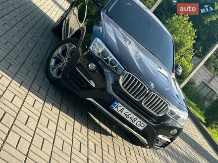 Черный БМВ Х4, объемом двигателя 2 л и пробегом 140 тыс. км за 20500 $, фото 1 на Automoto.ua